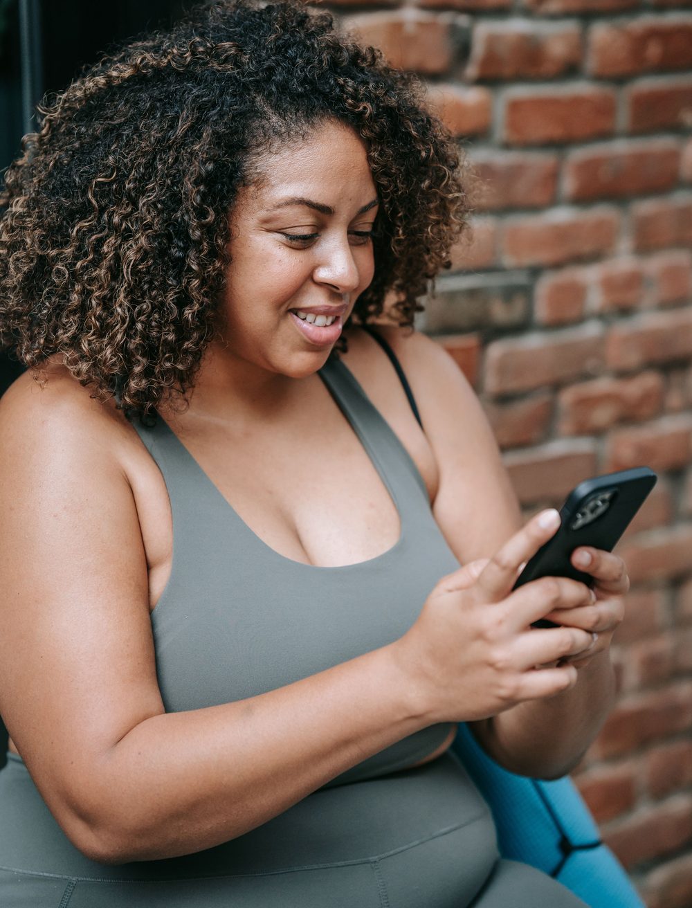 Completing a health questionnaire on a phone